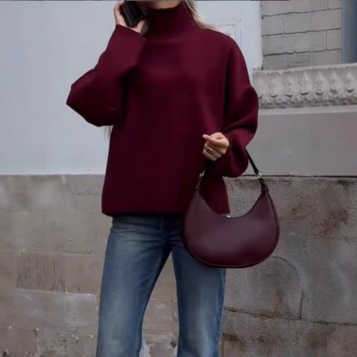 Damer oversized stickad tröja med hög krage och avslappnad passform Mirla-Eva Jonsson