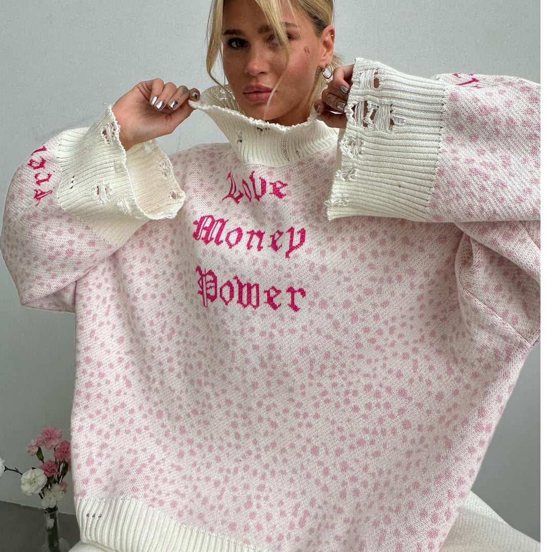 Damer oversized stickad tröja med iögonfallande tryck Mirla-Eva Jonsson