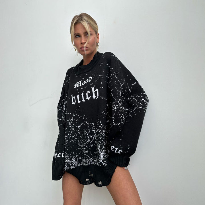 Damer oversized stickad tröja med iögonfallande tryck Mirla-Eva Jonsson