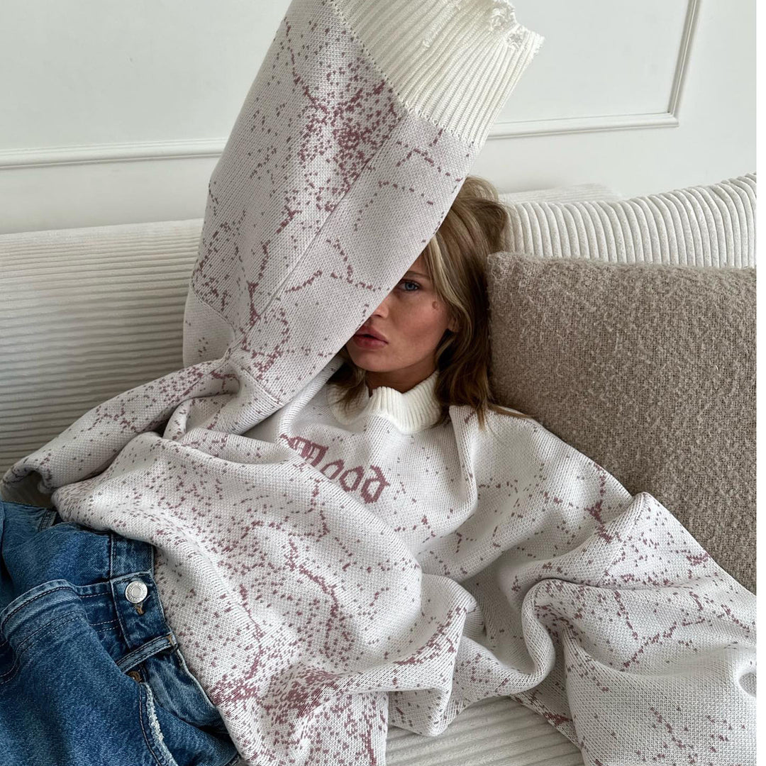 Damer oversized stickad tröja med iögonfallande tryck Mirla-Eva Jonsson