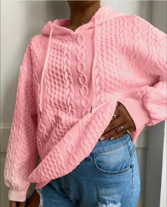 Damer oversized stickad tröja med kreativ kabel effekt och huva Mirla-Eva Jonsson