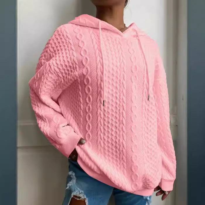 Damer oversized stickad tröja med kreativ kabel effekt och huva Mirla-Eva Jonsson