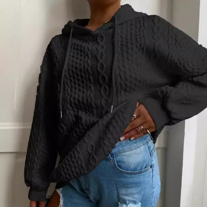 Damer oversized stickad tröja med kreativ kabel effekt och huva Mirla-Eva Jonsson