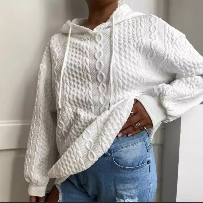 Damer oversized stickad tröja med kreativ kabel effekt och huva Mirla-Eva Jonsson