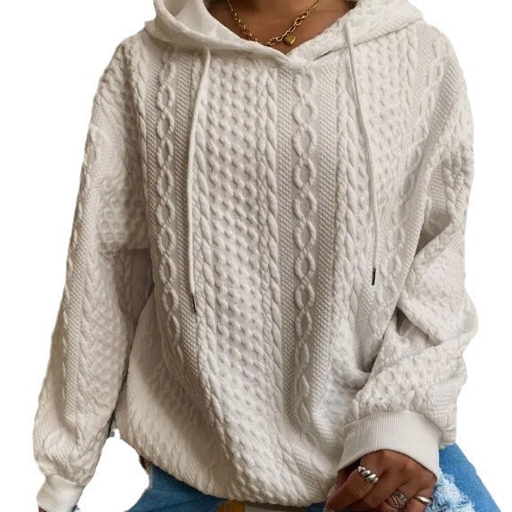 Damer oversized stickad tröja med kreativ kabel effekt och huva Mirla-Eva Jonsson