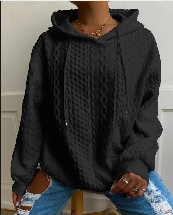 Damer oversized stickad tröja med kreativ kabel effekt och huva Mirla-Eva Jonsson