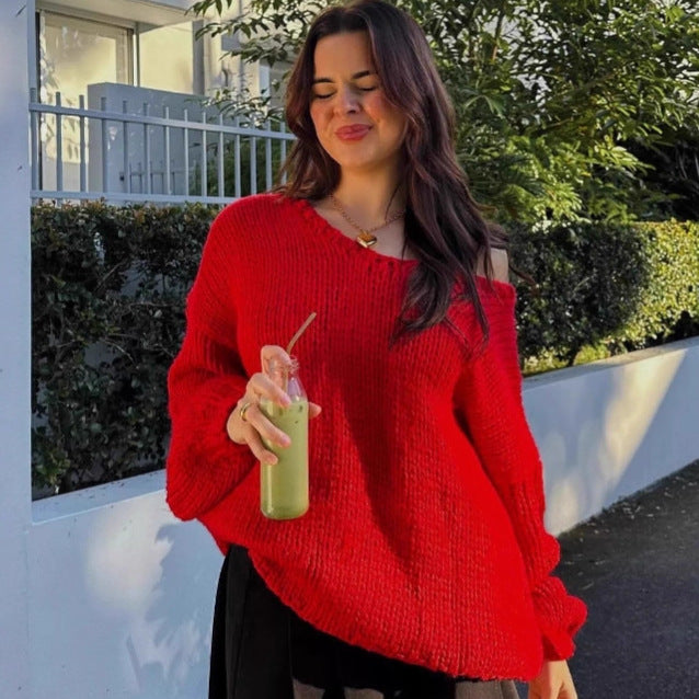 Damer oversized stickad tröja med öppna axlar och voluminösa ärmar Mirla-Eva Jonsson
