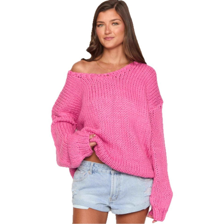 Damer oversized stickad tröja med öppna axlar och voluminösa ärmar Mirla-Eva Jonsson