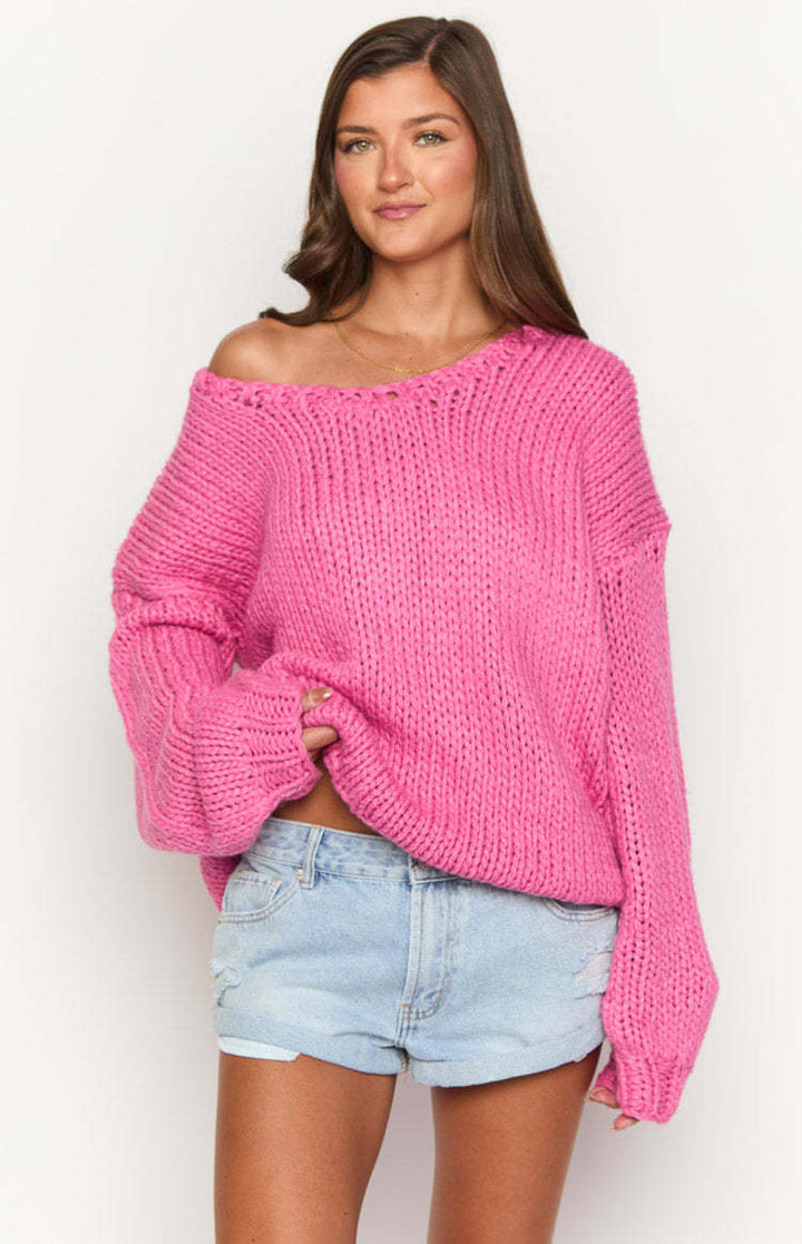 Damer oversized stickad tröja med öppna axlar och voluminösa ärmar Mirla-Eva Jonsson