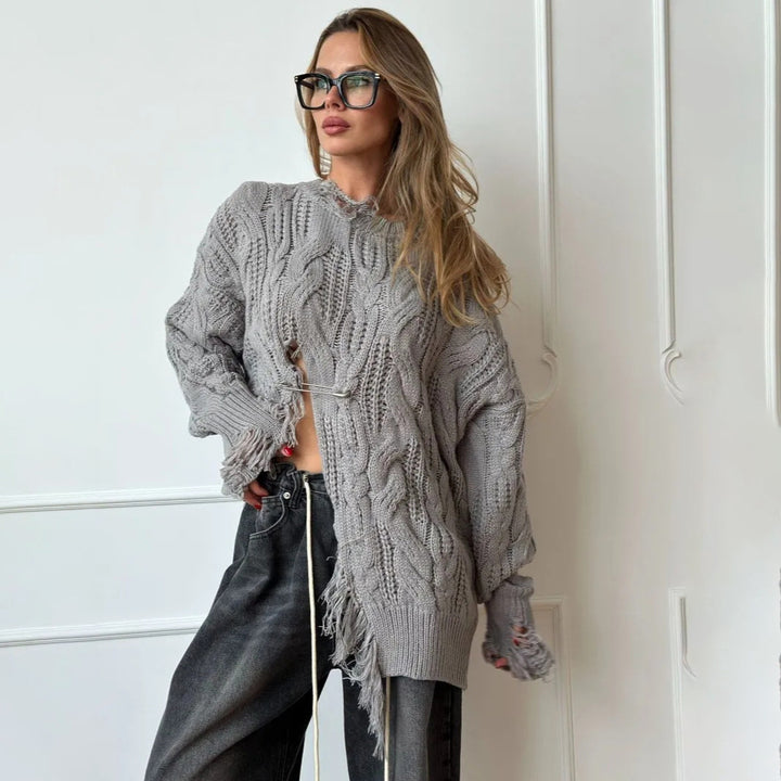 Damer oversized stickad tröja med raffinerad utskärning Mirla-Eva Jonsson