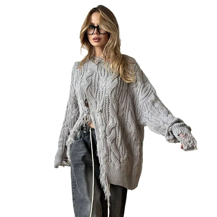 Damer oversized stickad tröja med raffinerad utskärning Mirla-Eva Jonsson