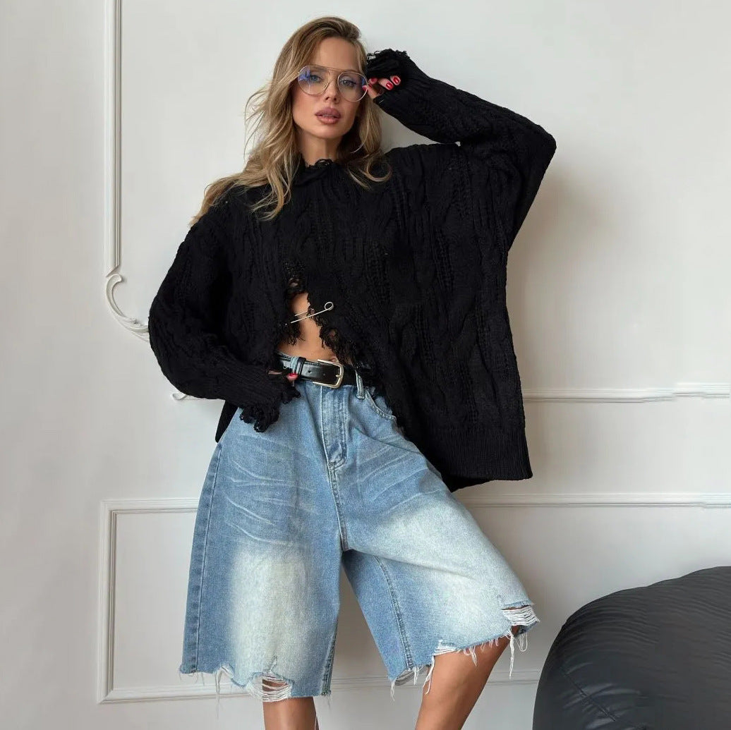 Damer oversized stickad tröja med raffinerad utskärning Mirla-Eva Jonsson