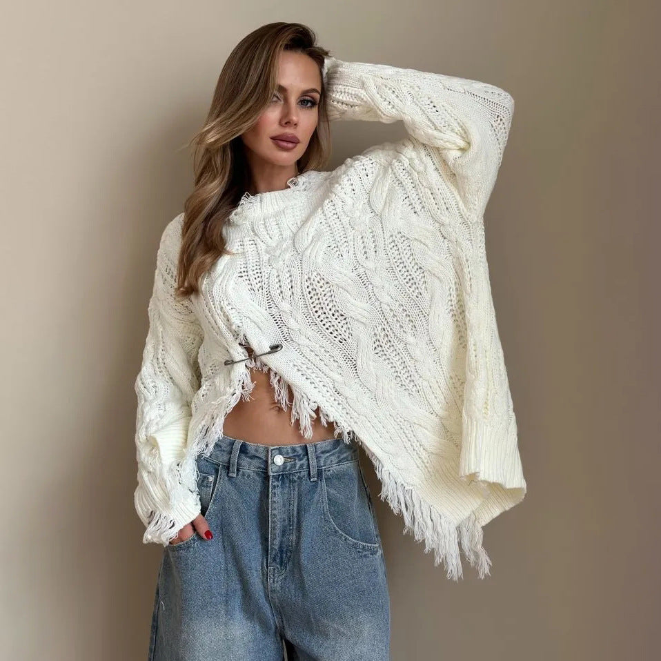 Damer oversized stickad tröja med raffinerad utskärning Mirla-Eva Jonsson