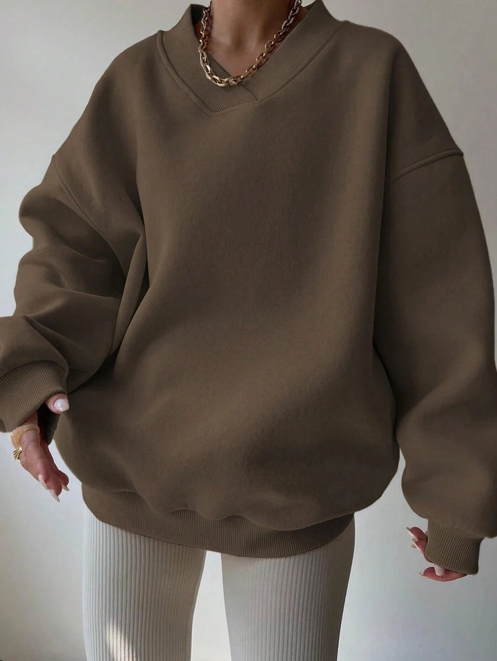 Damer oversized sweatshirt med V-hals Mirla-Eva Jonsson