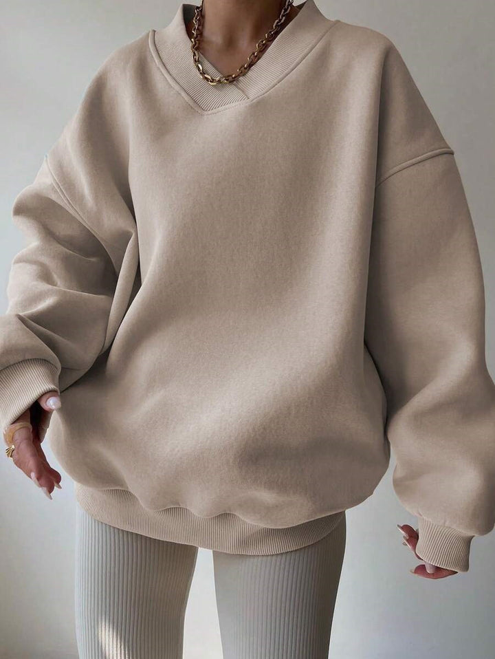 Damer oversized sweatshirt med V-hals Mirla-Eva Jonsson
