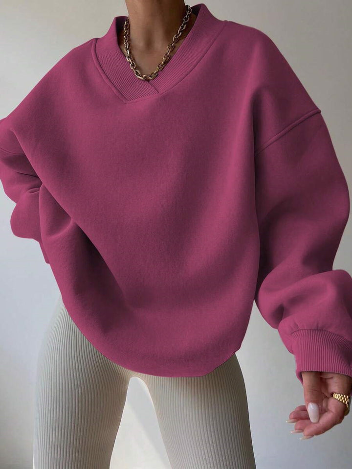 Damer oversized sweatshirt med V-hals Mirla-Eva Jonsson