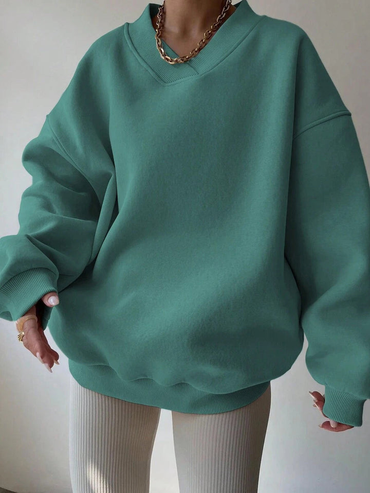 Damer oversized sweatshirt med V-hals Mirla-Eva Jonsson