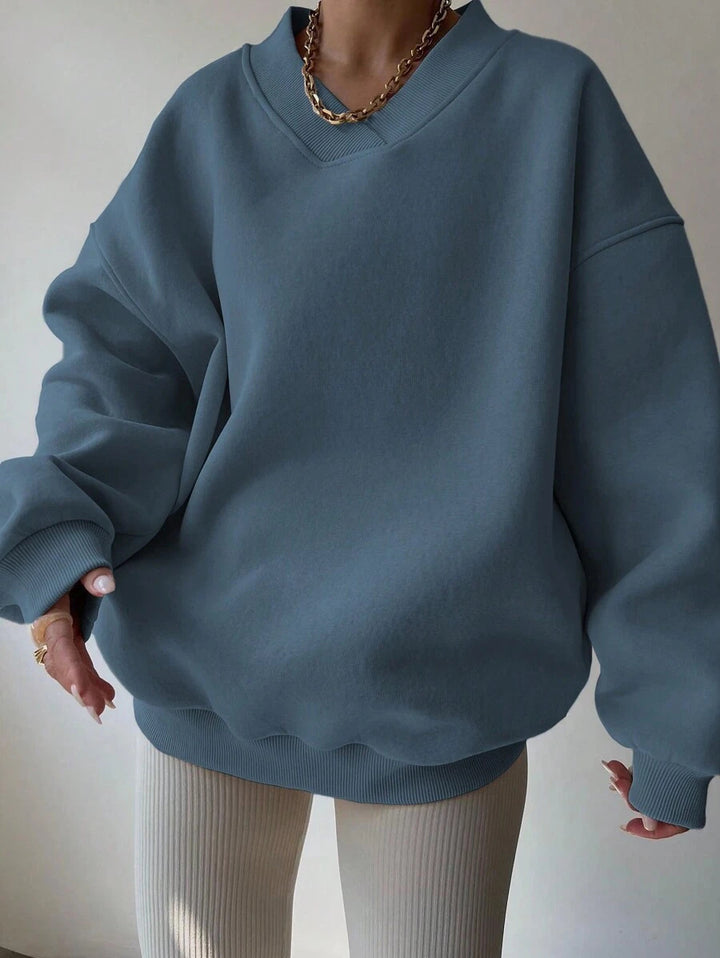 Damer oversized sweatshirt med V-hals Mirla-Eva Jonsson