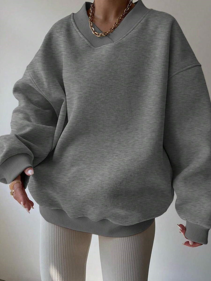 Damer oversized sweatshirt med V-hals Mirla-Eva Jonsson