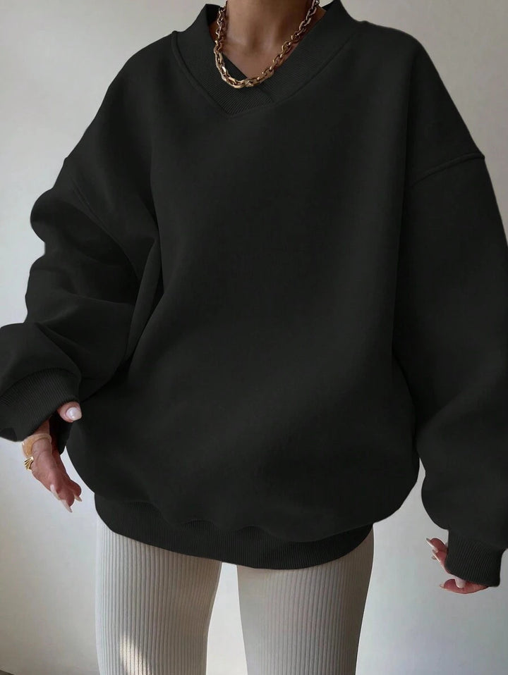 Damer oversized sweatshirt med V-hals Mirla-Eva Jonsson