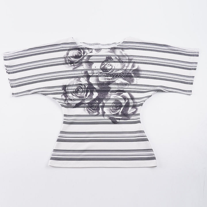 Damer oversized t-shirt med blommönstrad rand och elegant passform Mirla-Eva Jonsson