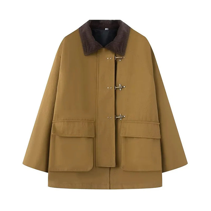 Damer oversized trenchjacka med klassisk ståkrage och praktiska fickor Mirla-Eva Jonsson