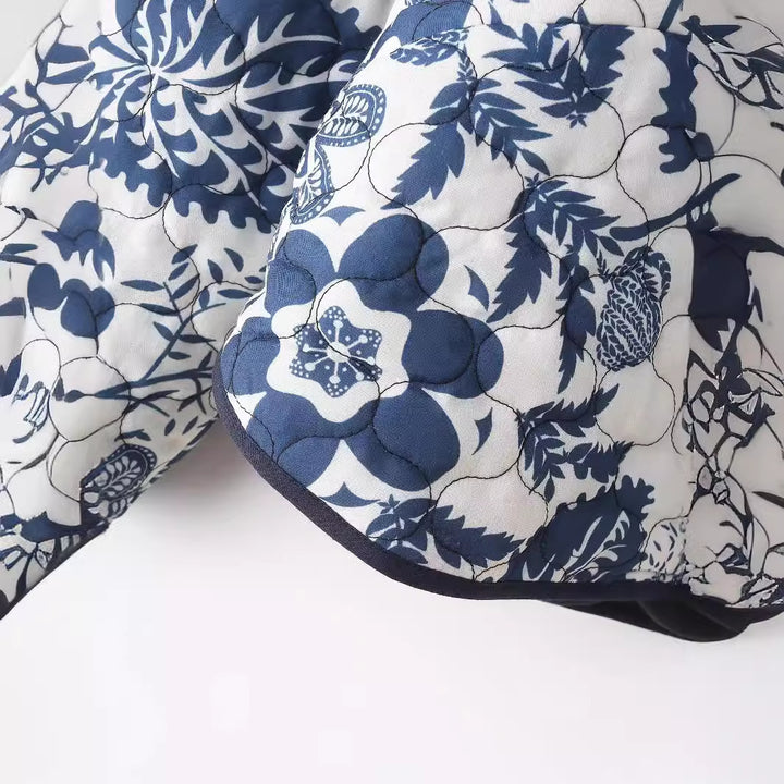 Damer quiltad blomjacka med innovativ ficka och rundhals Mirla-Eva Jonsson