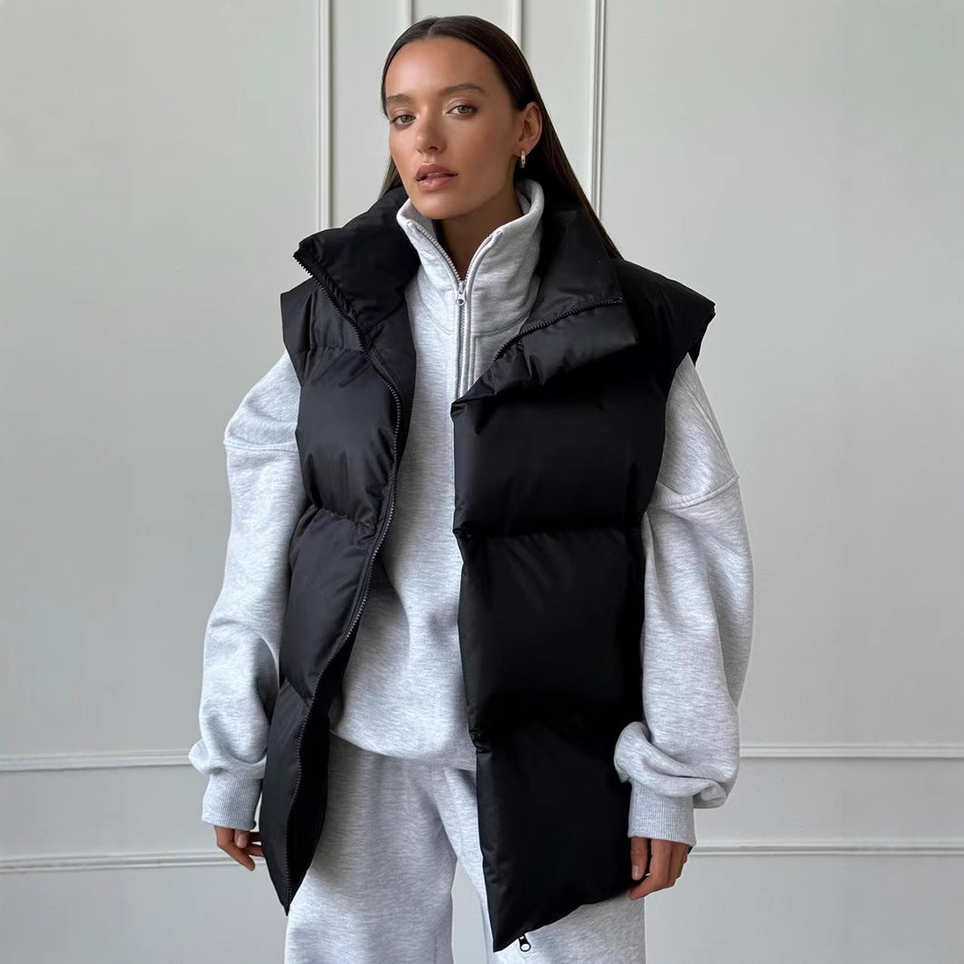 Damer quiltad väst med hög krage och fickor Mirla-Eva Jonsson