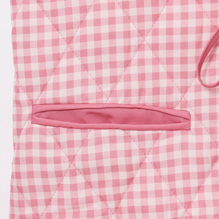 Damer quiltad viskoskappa med moderiktig slipsstängning och praktiska fickor Mirla-Eva Jonsson