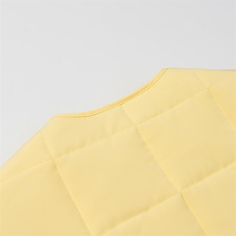 Damer quiltjacka med stora påsydda fickor och elegant knap closure Mirla-Eva Jonsson