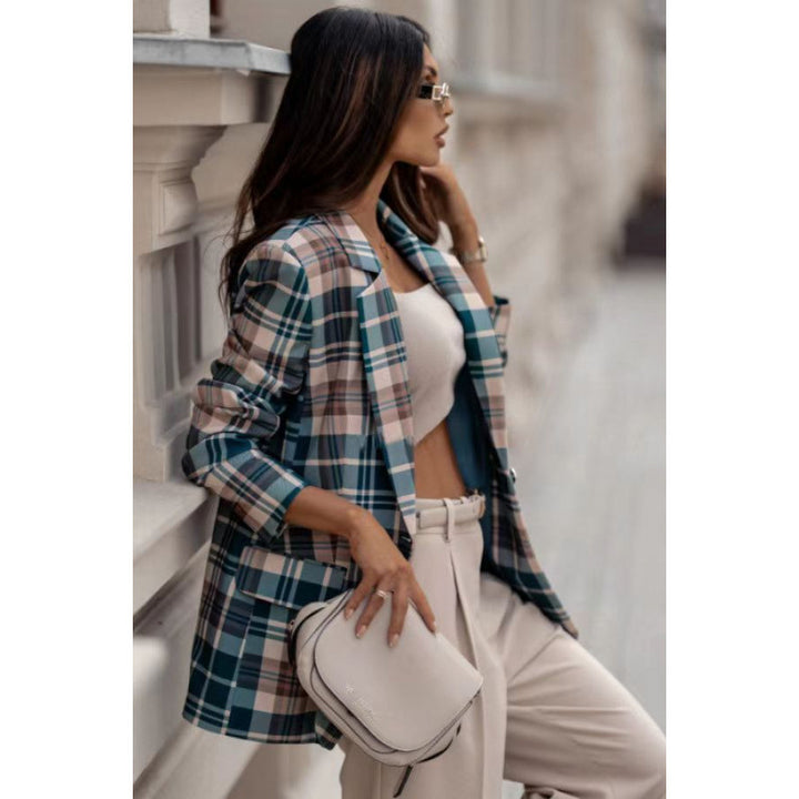 Damer rutblazer i modern oversized-slits med eleganta detaljer Mirla-Eva Jonsson