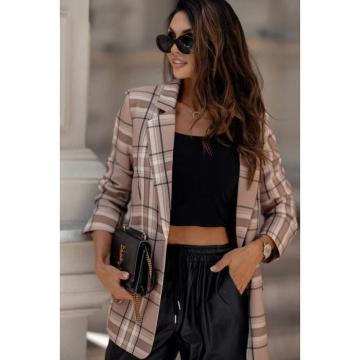 Damer rutblazer i modern oversized-slits med eleganta detaljer Mirla-Eva Jonsson