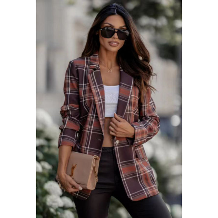 Damer rutblazer i modern oversized-slits med eleganta detaljer Mirla-Eva Jonsson