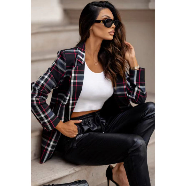 Damer rutblazer i modern oversized-slits med eleganta detaljer Mirla-Eva Jonsson