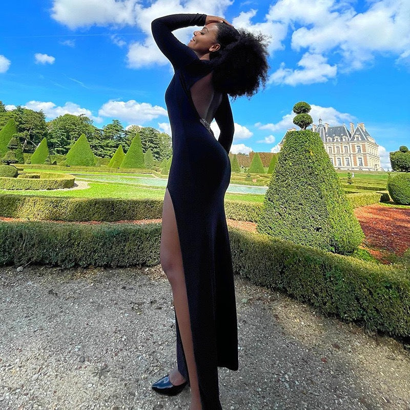 Damer rygglös maxikjol med elegant ryggvy och transparenta ärmar Mirla-Eva Jonsson