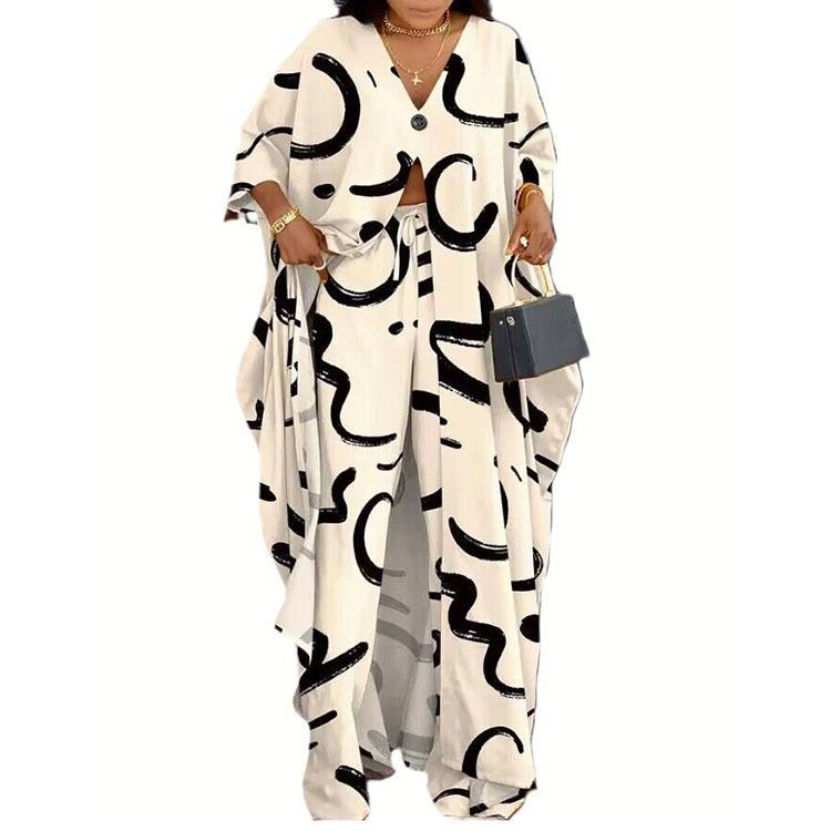 Damer set bestående av kimono-liknande överdel och vida byxor Mirla-Eva Jonsson