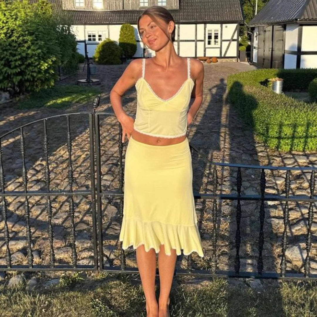 Damer set med crop-top och svängande kjol med spetsdetaljer Mirla-Eva Jonsson