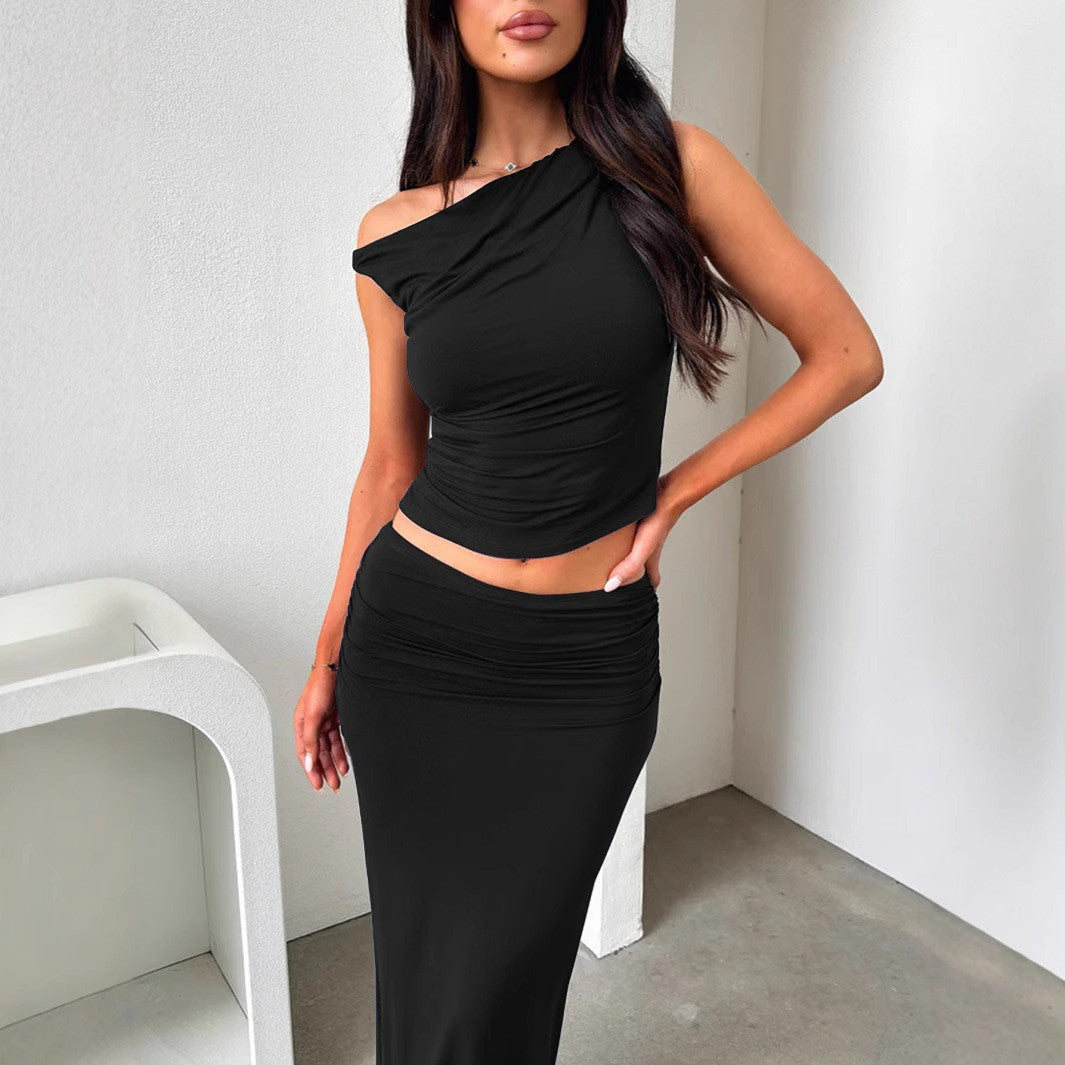 Damer set med off-shoulder topp och maxikjol i rynkad design Mirla-Eva Jonsson