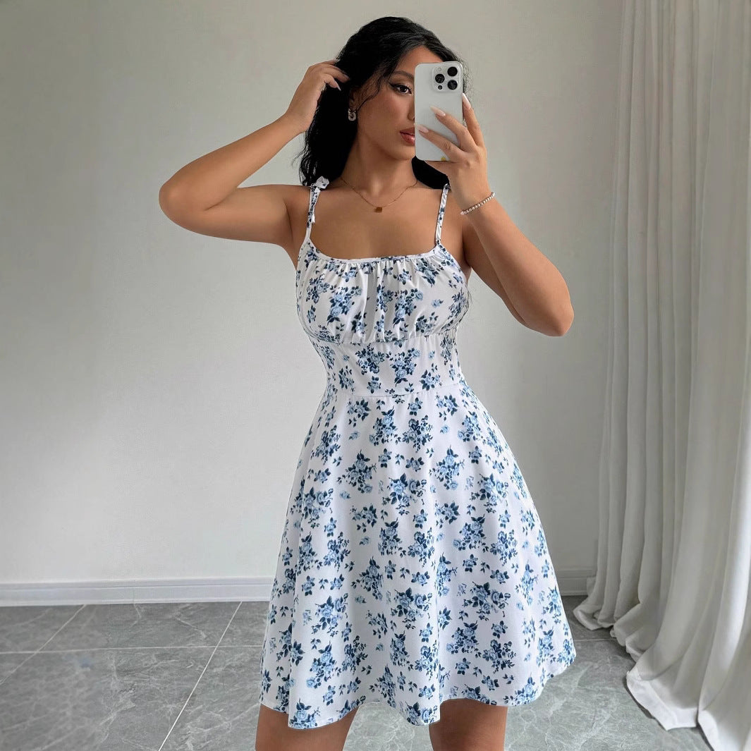 Damer sommar mini klänning med blommiga mönster och breda band Mirla-Eva Jonsson