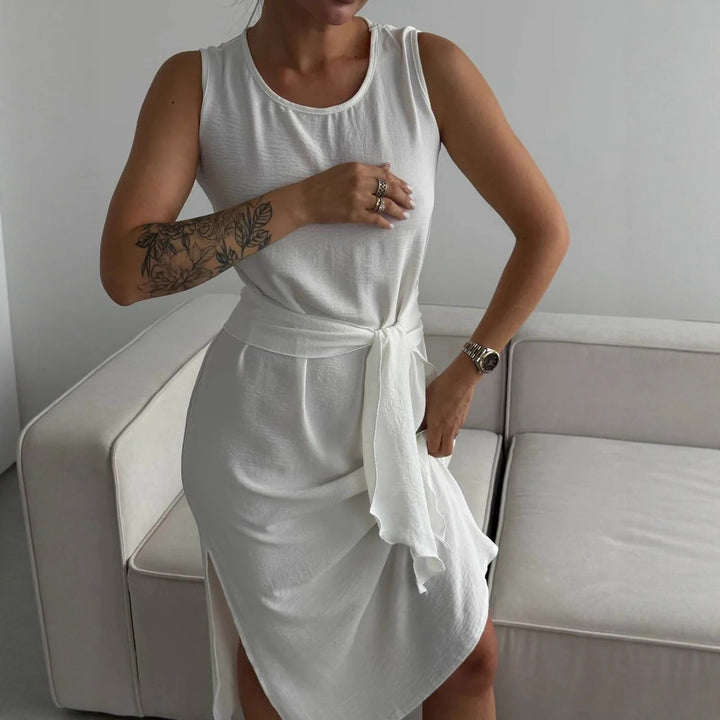 Damer sommarinspirerad omlottklänning med sidoflik och figursydd design Mirla-Eva Jonsson