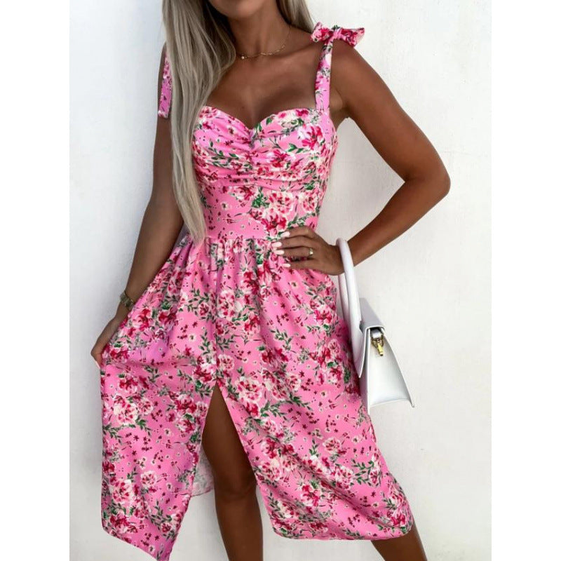 Damer sommarklänning med blommigt mönster och lekfullt knutna band Mirla-Eva Jonsson