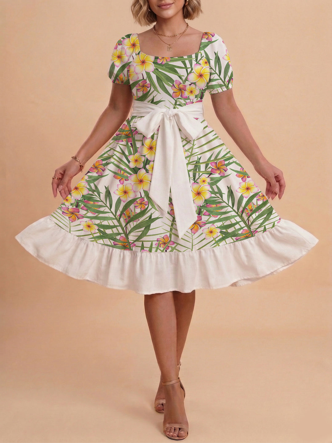 Damer sommarklänning med floral puffärm och midjejusterbart bälte Mirla-Eva Jonsson