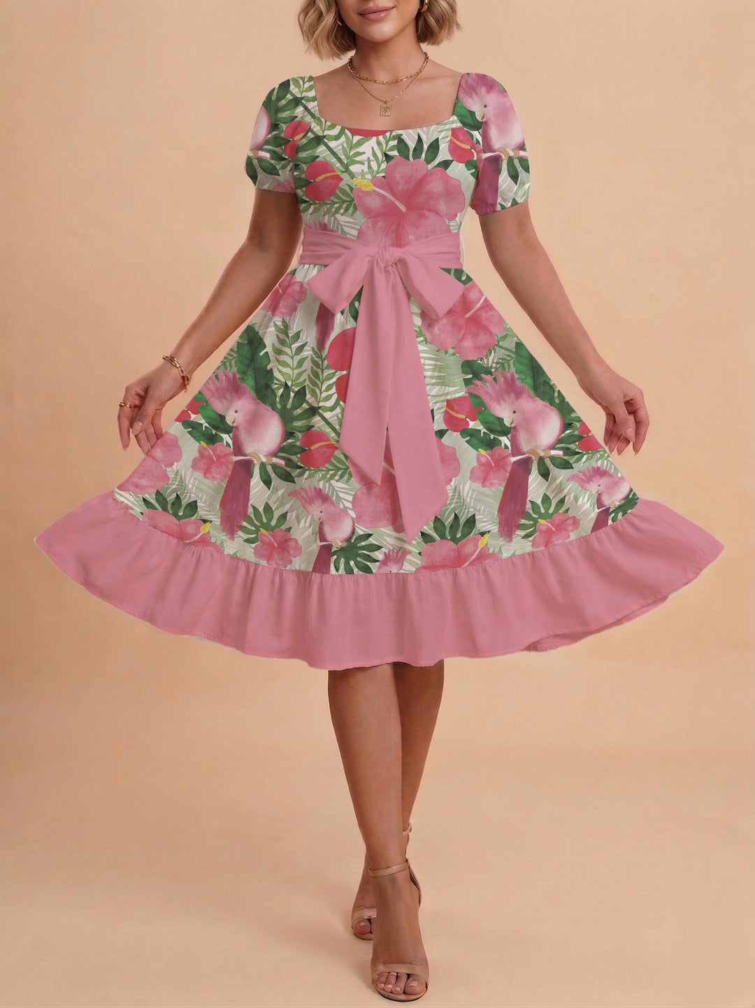 Damer sommarklänning med floral puffärm och midjejusterbart bälte Mirla-Eva Jonsson