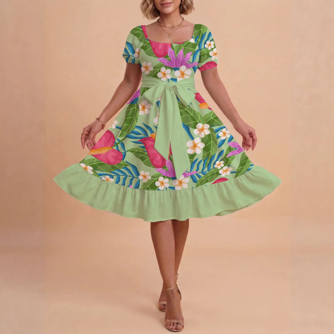 Damer sommarklänning med floral puffärm och midjejusterbart bälte Mirla-Eva Jonsson