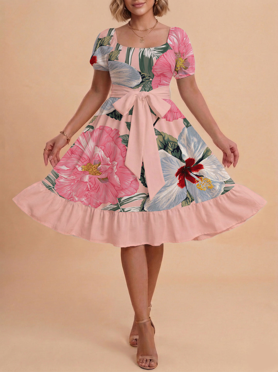 Damer sommarklänning med floral puffärm och midjejusterbart bälte Mirla-Eva Jonsson