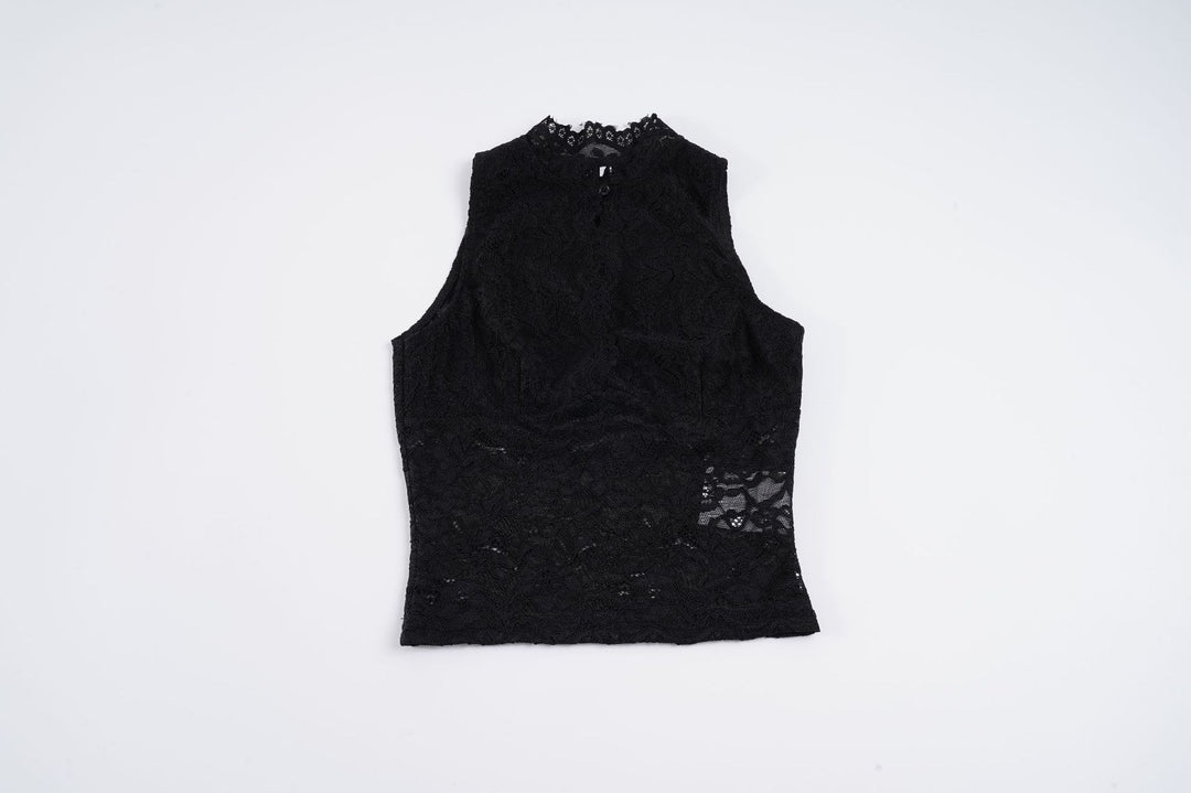 Damer spets-crop-top med elegant ståkrage och transparenta insatser Mirla-Eva Jonsson