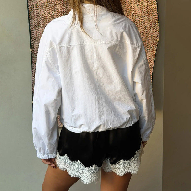Damer sportbodysuit med elastiska shorts och spetsdetaljer Mirla-Eva Jonsson