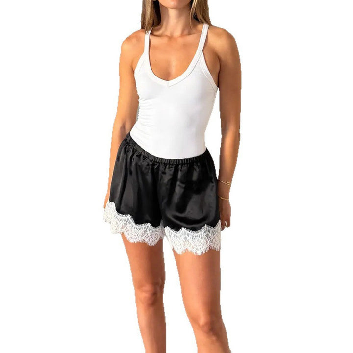 Damer sportbodysuit med elastiska shorts och spetsdetaljer Mirla-Eva Jonsson