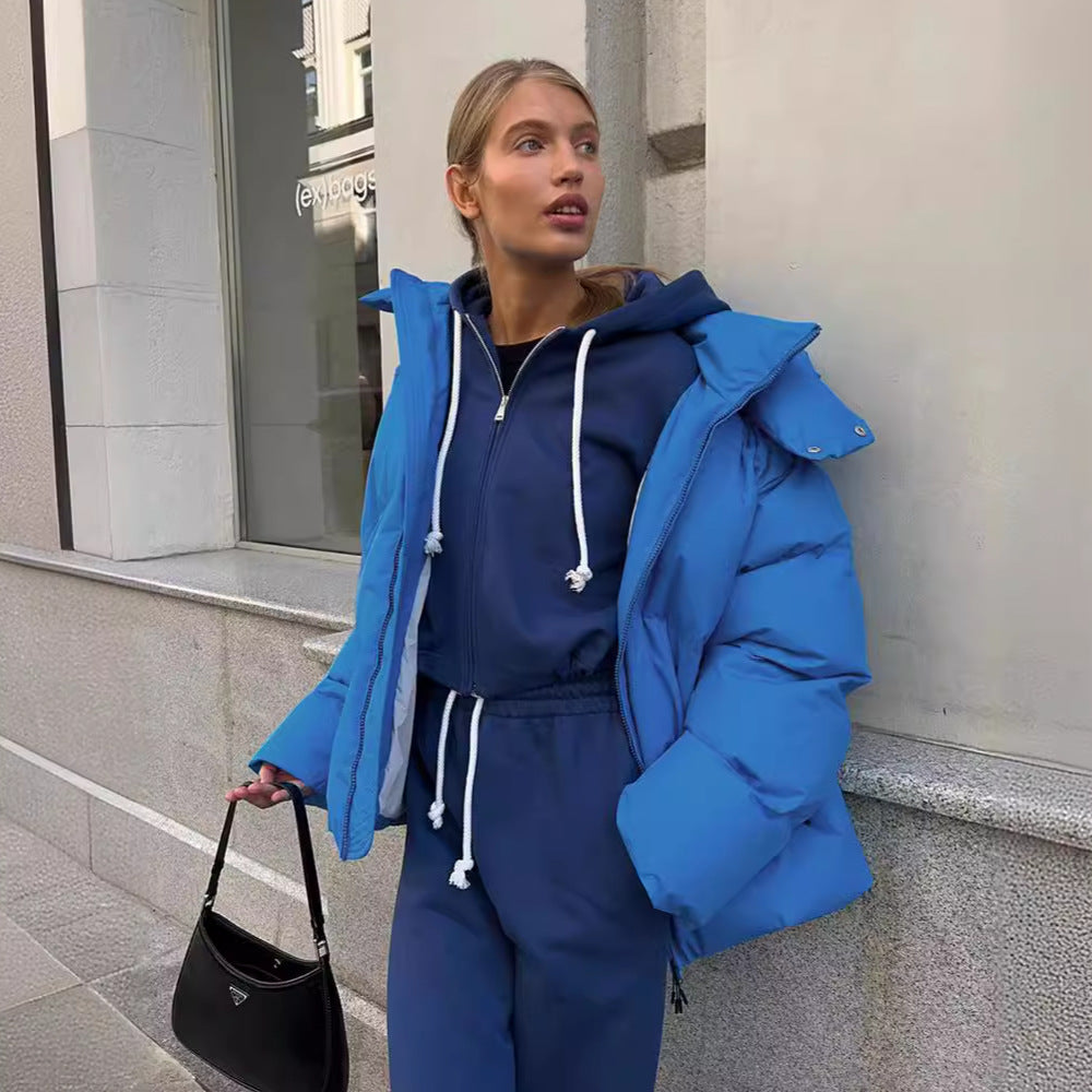 Damer sportig dunjacka med hög krage och voluminös passform Mirla-Eva Jonsson
