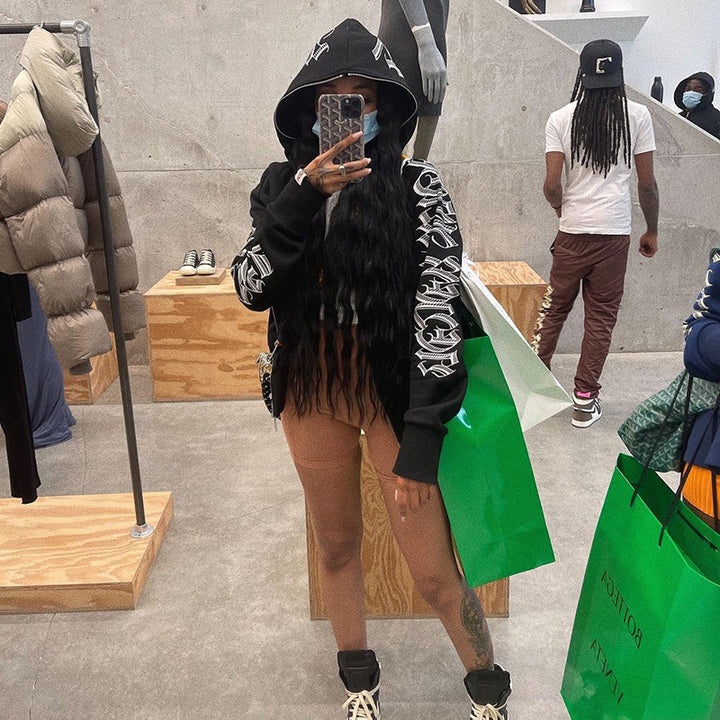 Damer sportig hoodie med innovativ grafisk design Mirla-Eva Jonsson